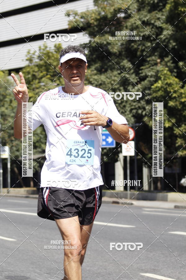 Buy your photos of the eventMaratona e Meia Maratona das Gerais on Fotop