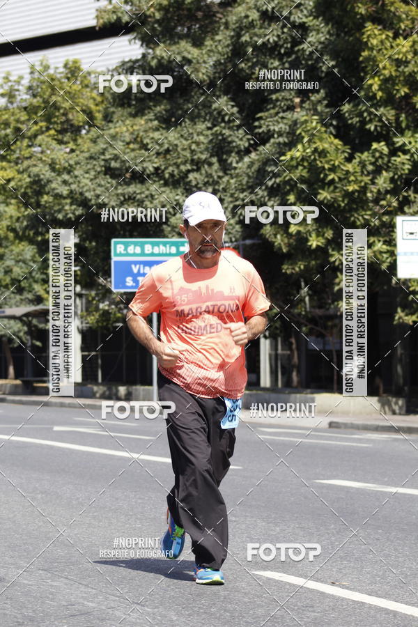 Buy your photos of the eventMaratona e Meia Maratona das Gerais on Fotop