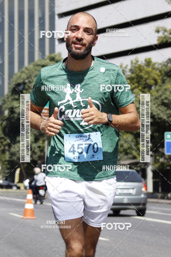 Buy your photos of the eventMaratona e Meia Maratona das Gerais on Fotop
