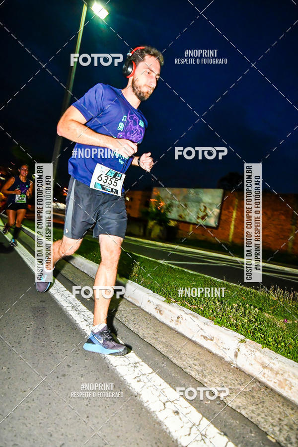 Buy your photos of the eventItu Night Run on Fotop