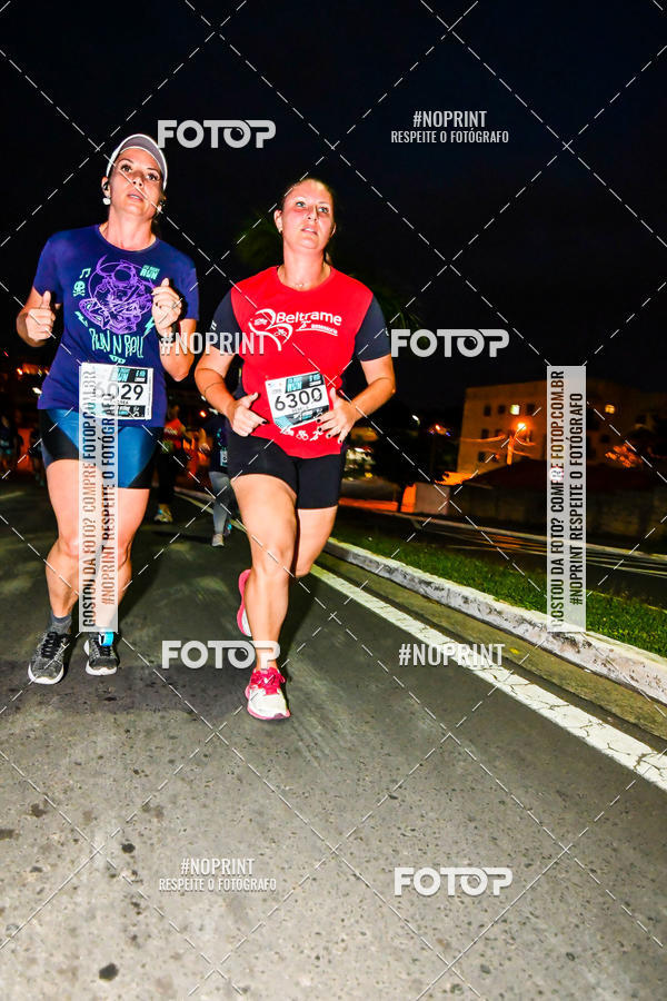 Buy your photos of the eventItu Night Run on Fotop