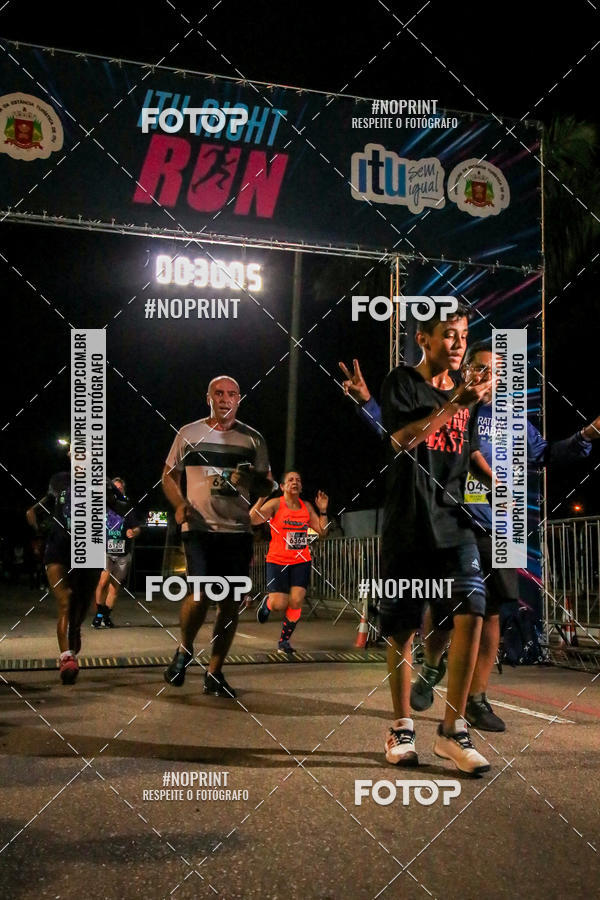 Buy your photos of the eventItu Night Run on Fotop