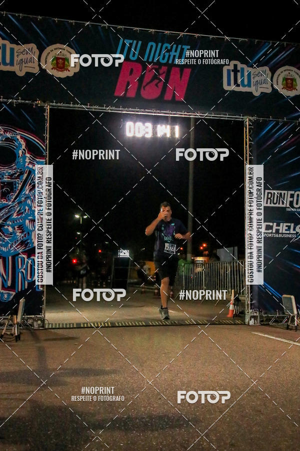 Buy your photos of the eventItu Night Run on Fotop