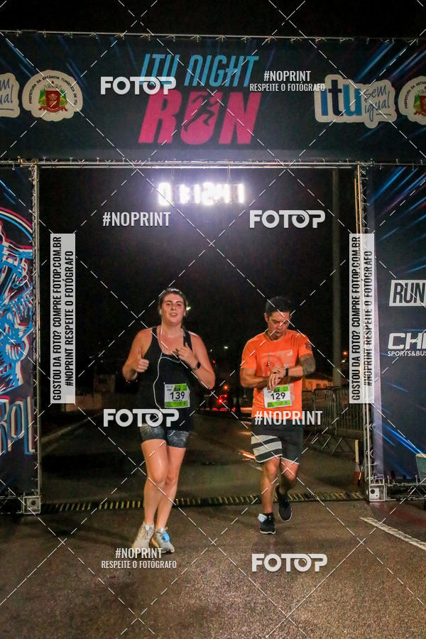Buy your photos of the eventItu Night Run on Fotop
