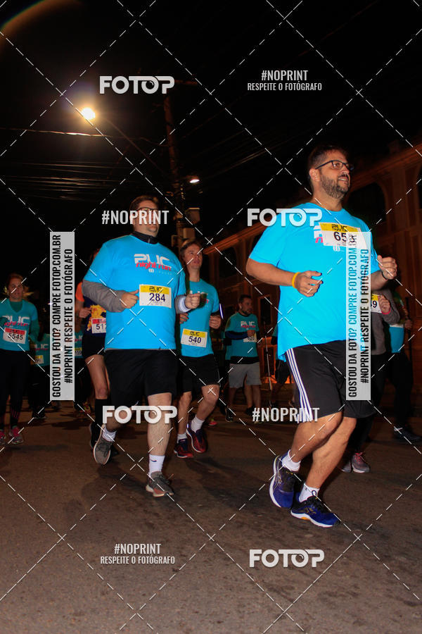 Buy your photos of the eventPUC NIGHT RUN on Fotop