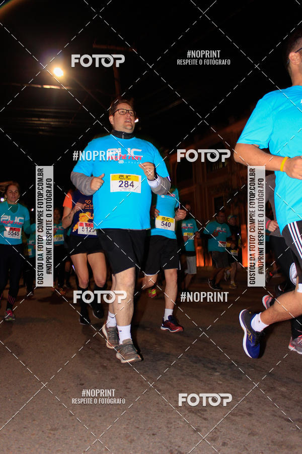 Buy your photos of the eventPUC NIGHT RUN on Fotop