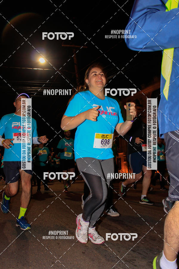 Buy your photos of the eventPUC NIGHT RUN on Fotop