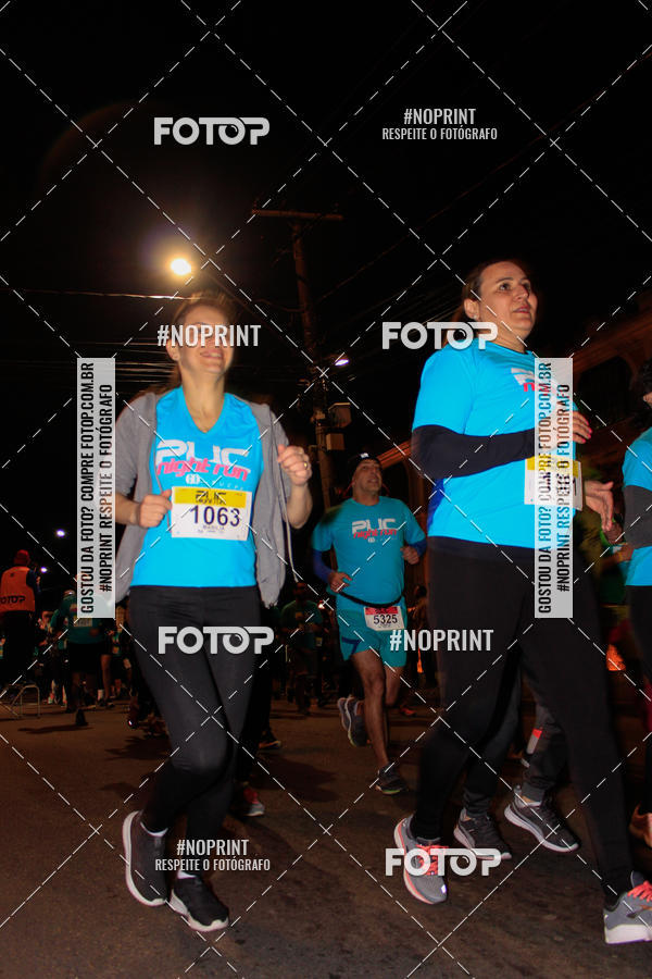 Buy your photos of the eventPUC NIGHT RUN on Fotop