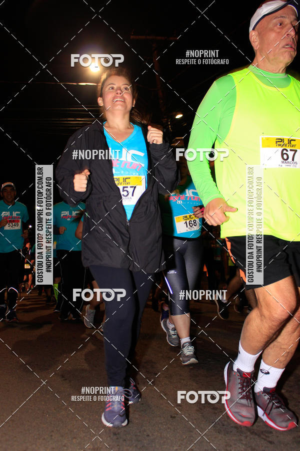Buy your photos of the eventPUC NIGHT RUN on Fotop