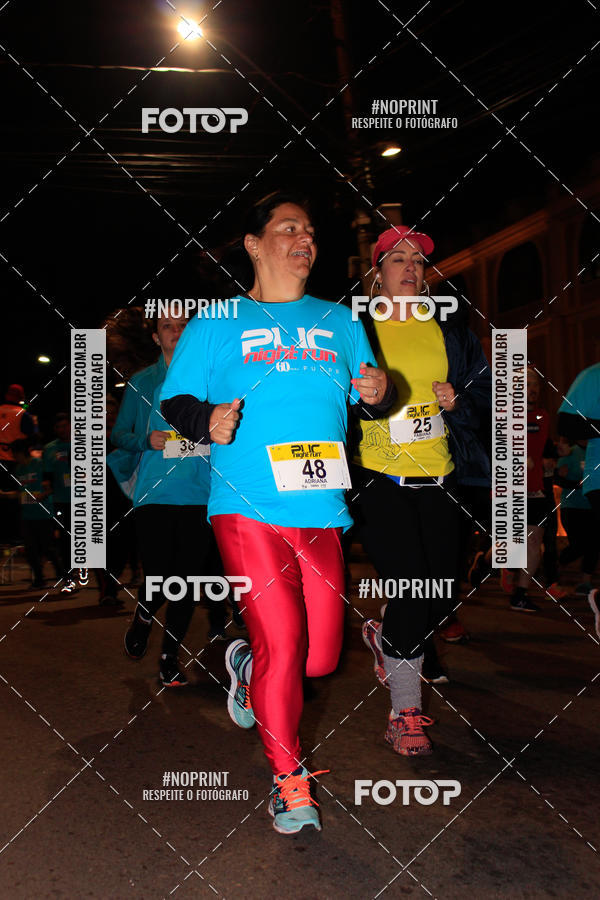 Buy your photos of the eventPUC NIGHT RUN on Fotop