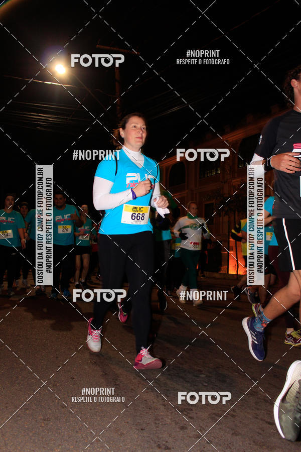 Buy your photos of the eventPUC NIGHT RUN on Fotop