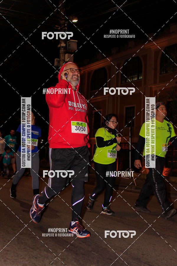 Buy your photos of the eventPUC NIGHT RUN on Fotop