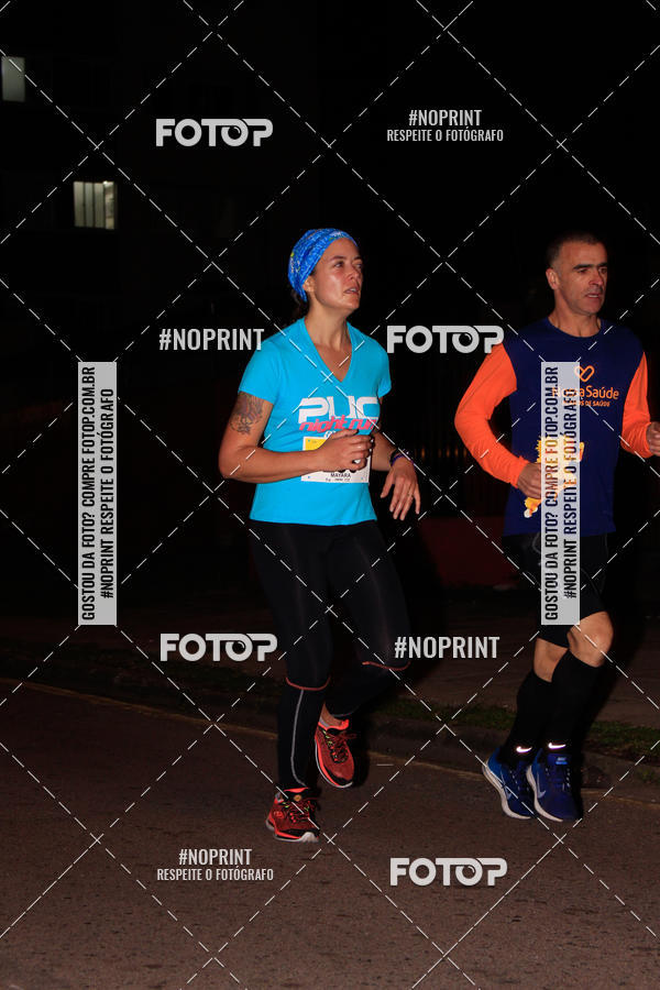 Buy your photos of the eventPUC NIGHT RUN on Fotop