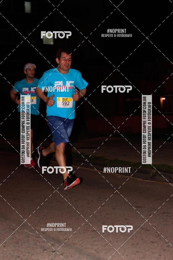 Buy your photos of the eventPUC NIGHT RUN on Fotop