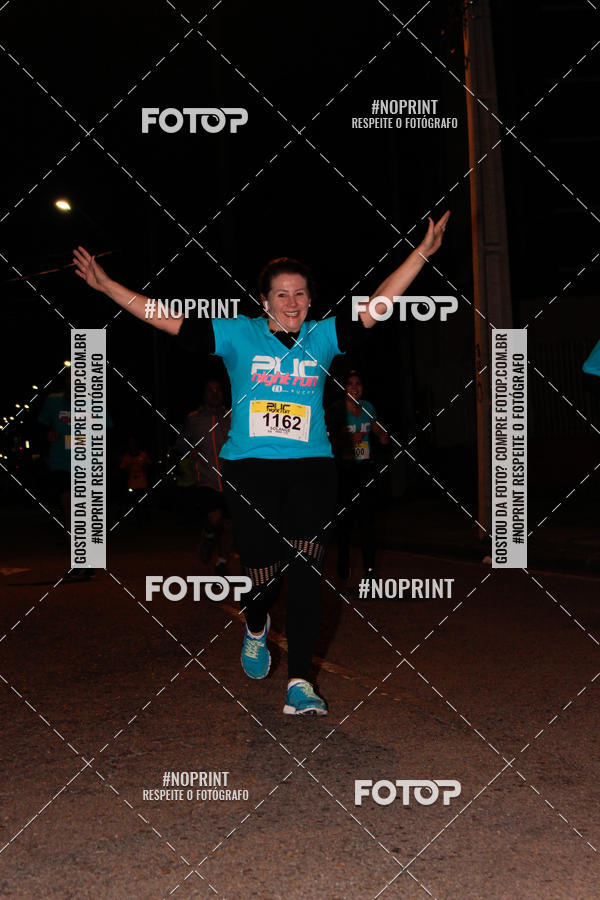 Buy your photos of the eventPUC NIGHT RUN on Fotop
