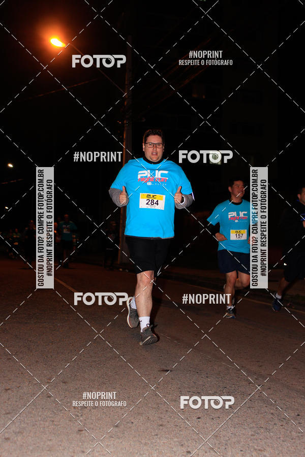 Buy your photos of the eventPUC NIGHT RUN on Fotop