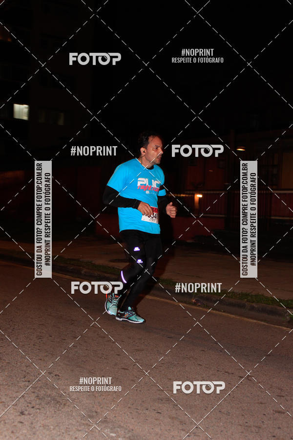 Buy your photos of the eventPUC NIGHT RUN on Fotop