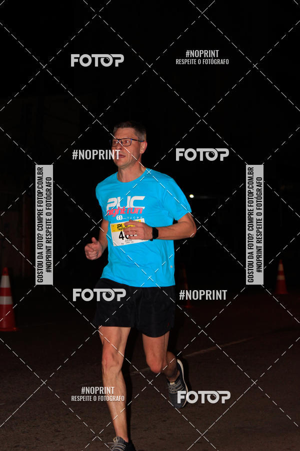 Buy your photos of the eventPUC NIGHT RUN on Fotop