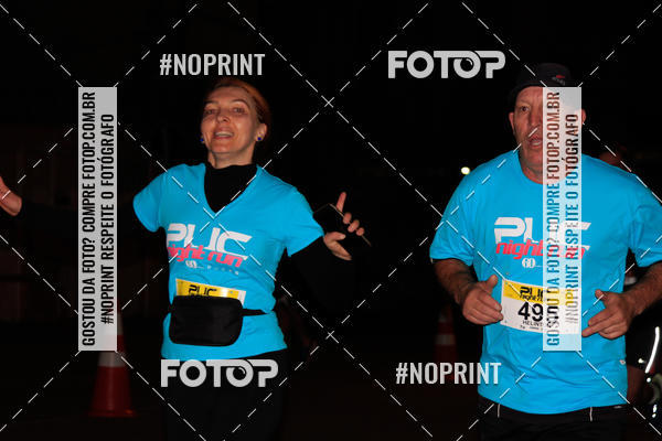 Buy your photos of the eventPUC NIGHT RUN on Fotop
