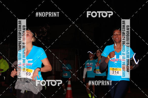 Buy your photos of the eventPUC NIGHT RUN on Fotop