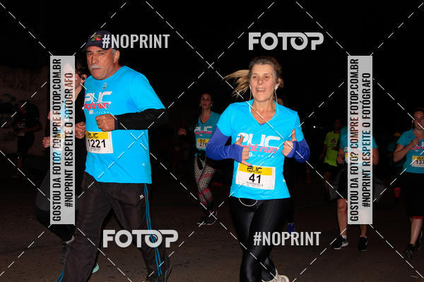 Buy your photos of the eventPUC NIGHT RUN on Fotop