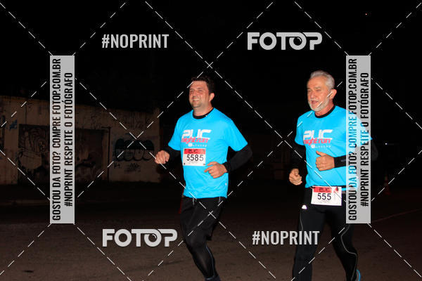 Buy your photos of the eventPUC NIGHT RUN on Fotop