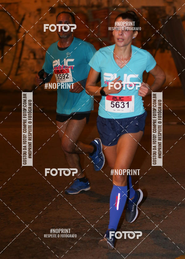 Buy your photos of the eventPUC NIGHT RUN on Fotop