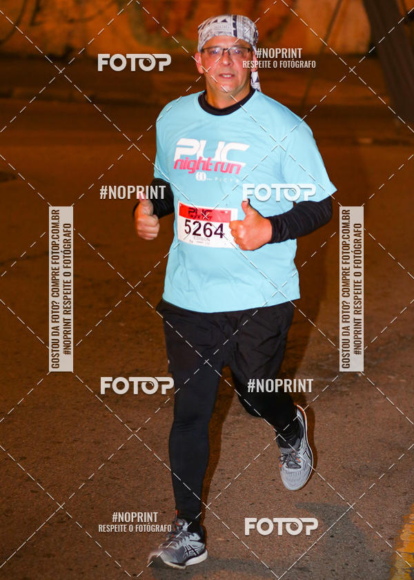 Buy your photos of the eventPUC NIGHT RUN on Fotop