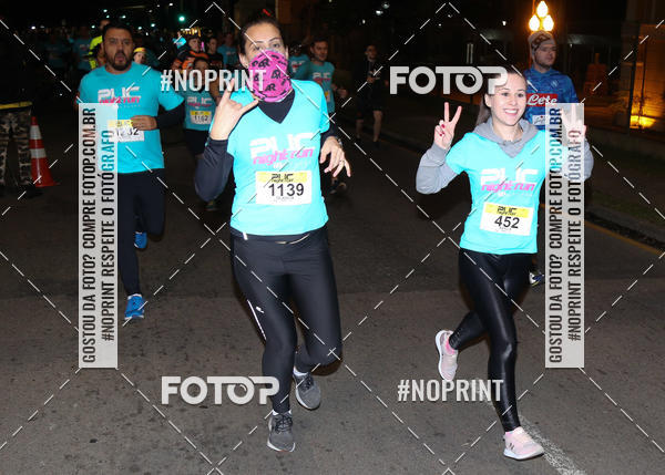 Buy your photos of the eventPUC NIGHT RUN on Fotop