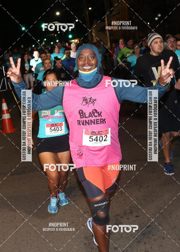 Buy your photos of the eventPUC NIGHT RUN on Fotop