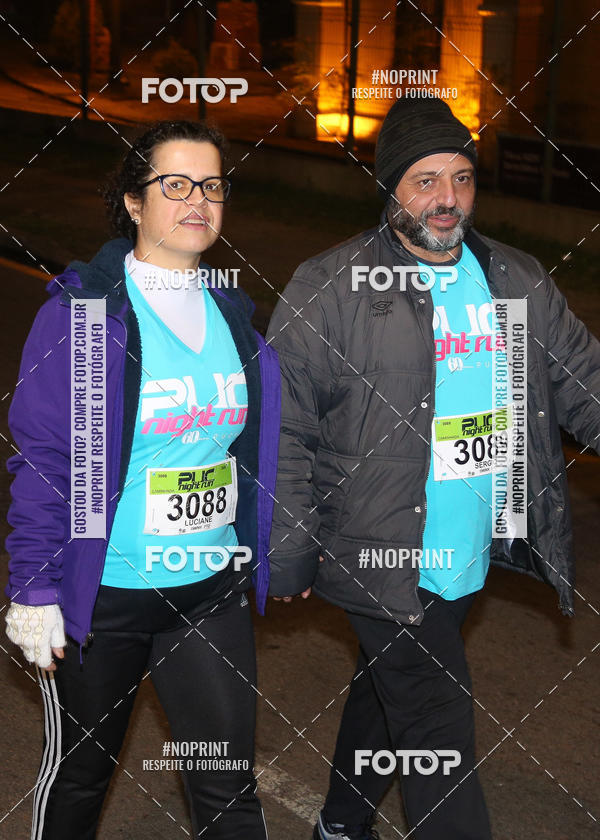 Buy your photos of the eventPUC NIGHT RUN on Fotop