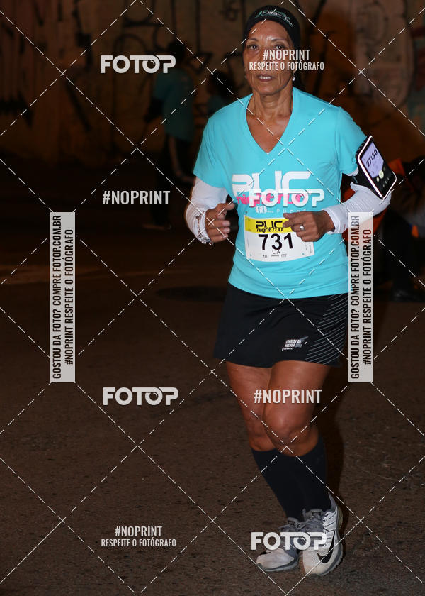 Buy your photos of the eventPUC NIGHT RUN on Fotop