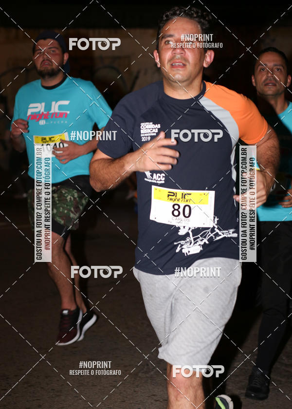 Buy your photos of the eventPUC NIGHT RUN on Fotop