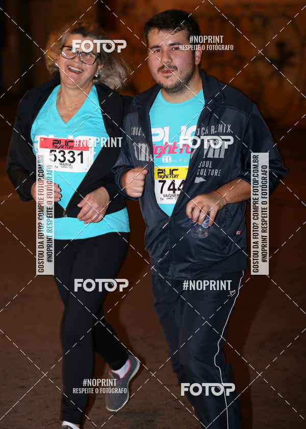 Buy your photos of the eventPUC NIGHT RUN on Fotop