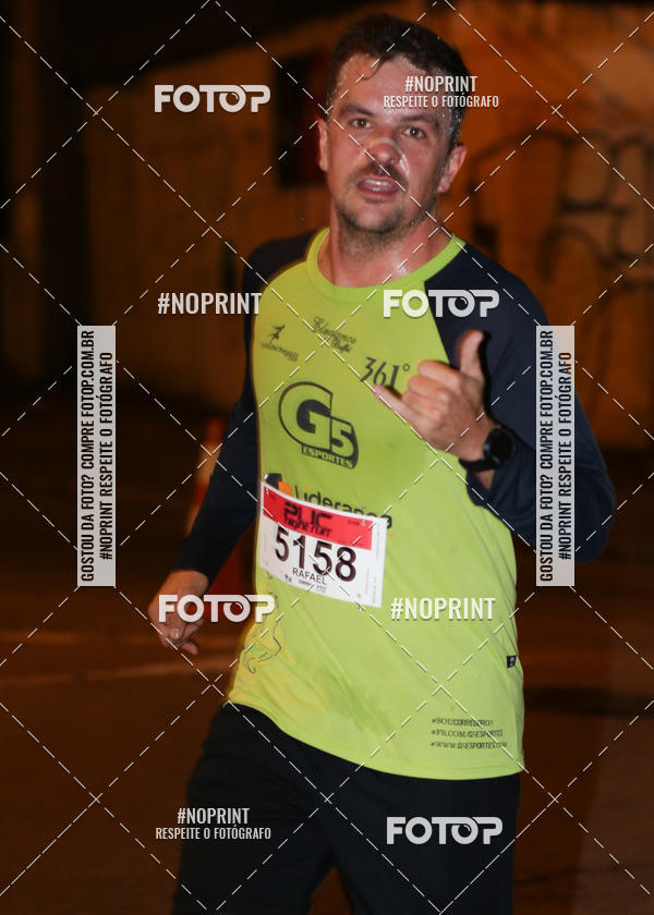 Buy your photos of the eventPUC NIGHT RUN on Fotop