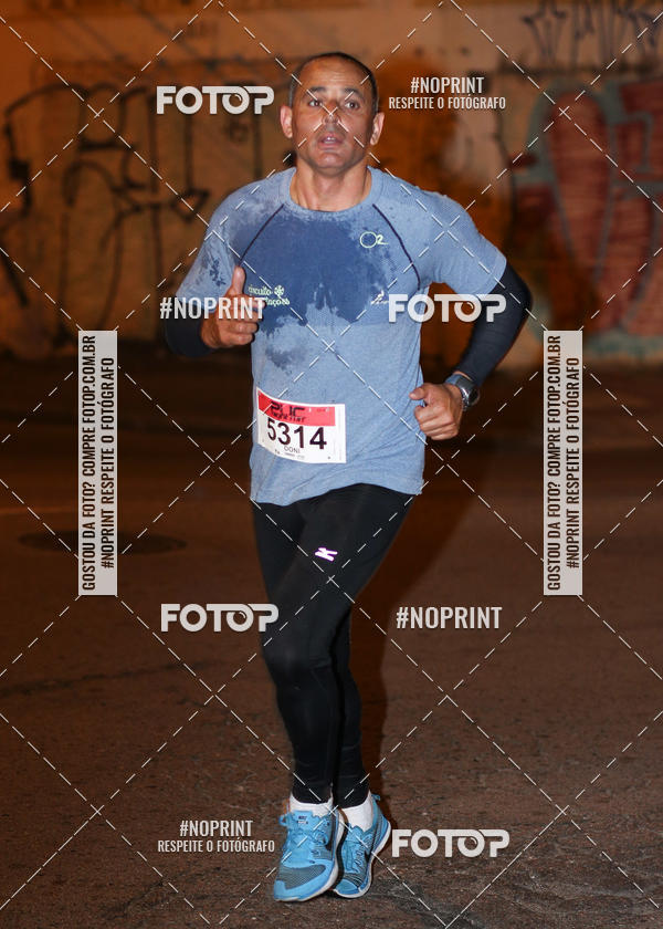 Buy your photos of the eventPUC NIGHT RUN on Fotop