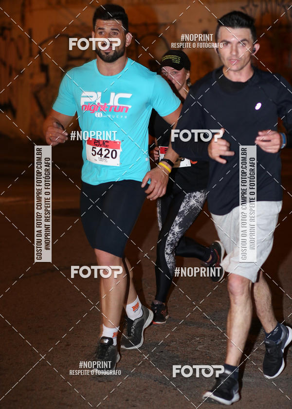 Buy your photos of the eventPUC NIGHT RUN on Fotop