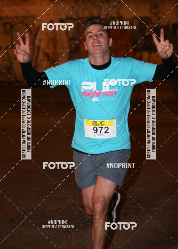 Buy your photos of the eventPUC NIGHT RUN on Fotop