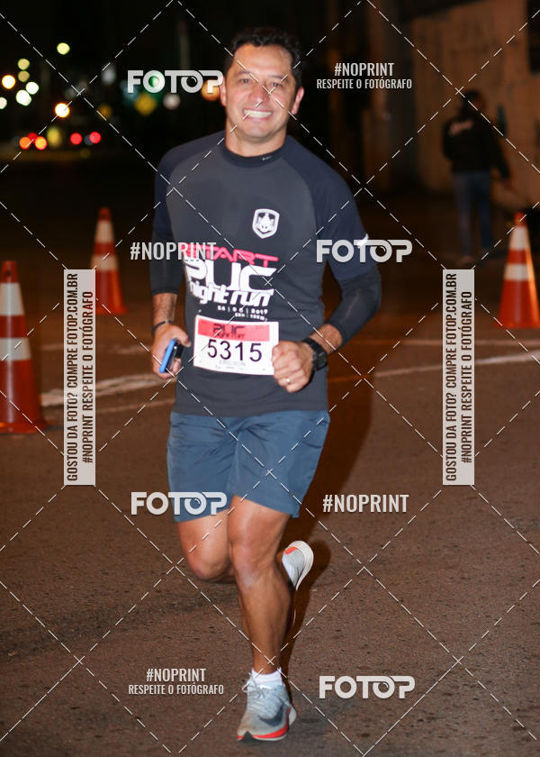 Buy your photos of the eventPUC NIGHT RUN on Fotop