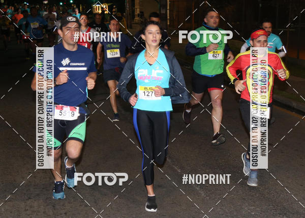 Buy your photos of the eventPUC NIGHT RUN on Fotop