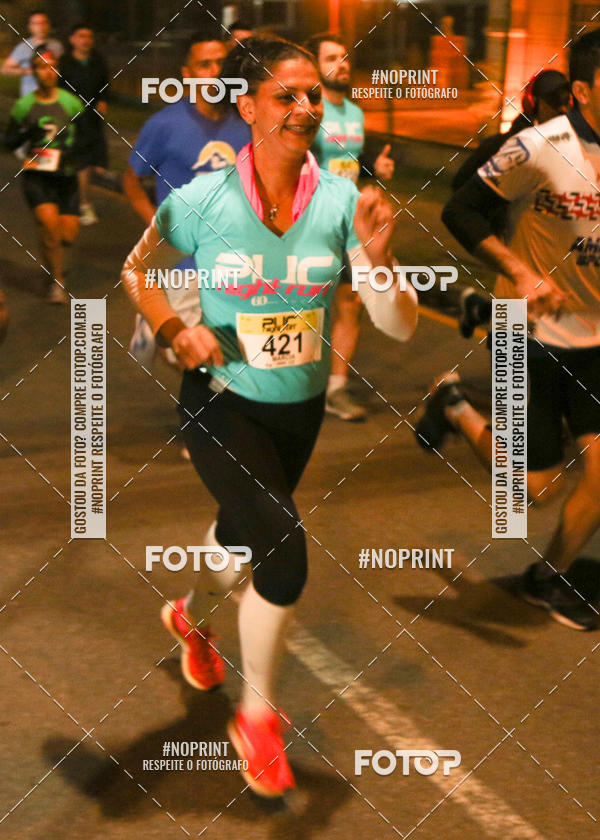 Buy your photos of the eventPUC NIGHT RUN on Fotop