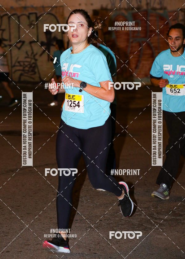 Buy your photos of the eventPUC NIGHT RUN on Fotop