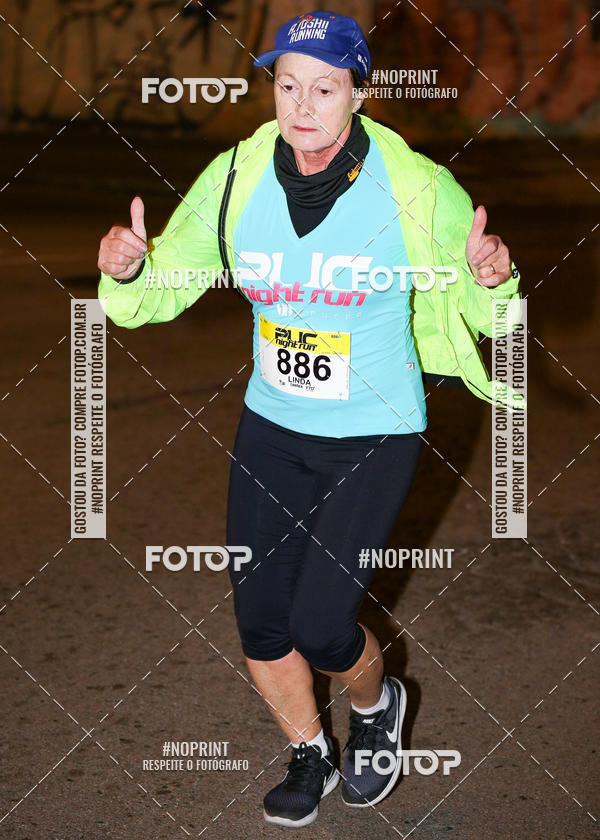 Buy your photos of the eventPUC NIGHT RUN on Fotop