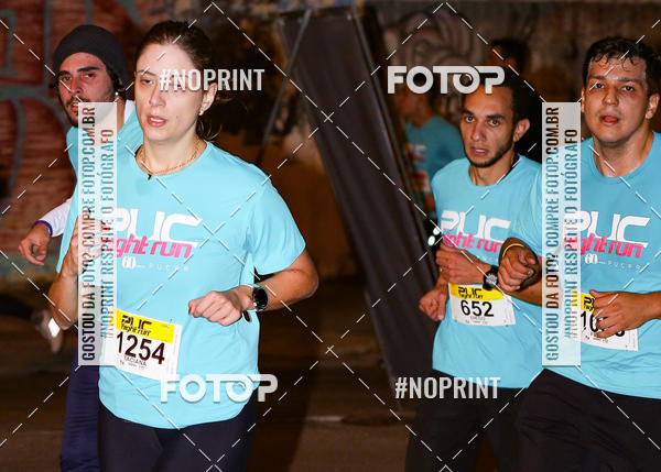 Buy your photos of the eventPUC NIGHT RUN on Fotop
