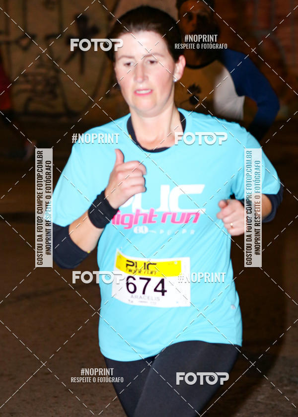 Buy your photos of the eventPUC NIGHT RUN on Fotop