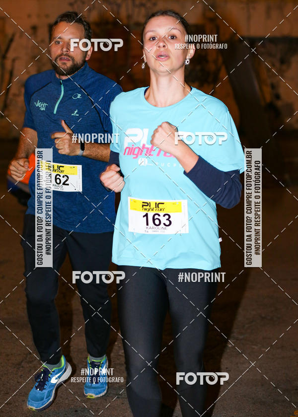 Buy your photos of the eventPUC NIGHT RUN on Fotop