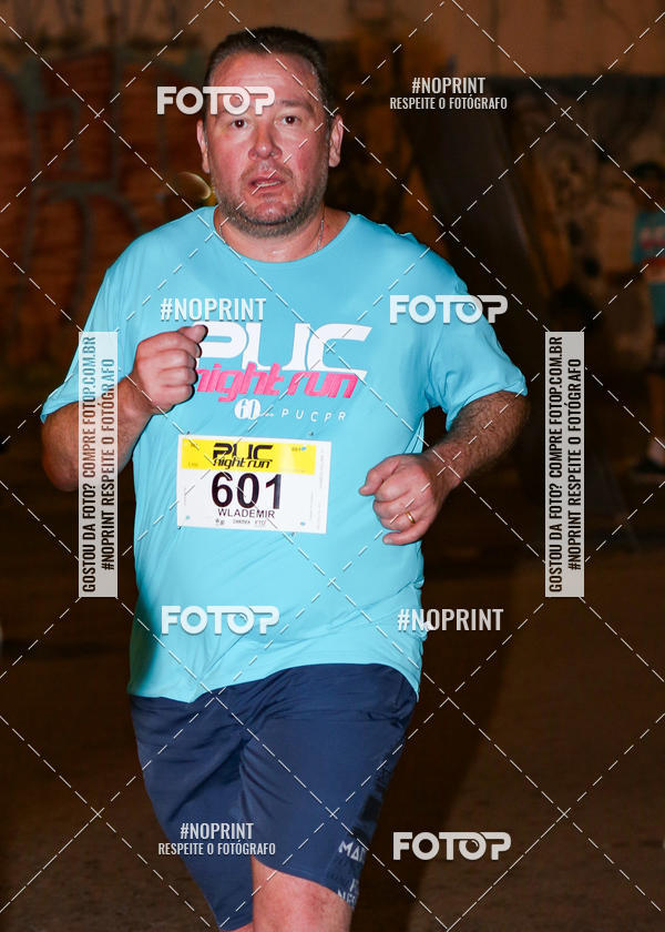 Buy your photos of the eventPUC NIGHT RUN on Fotop