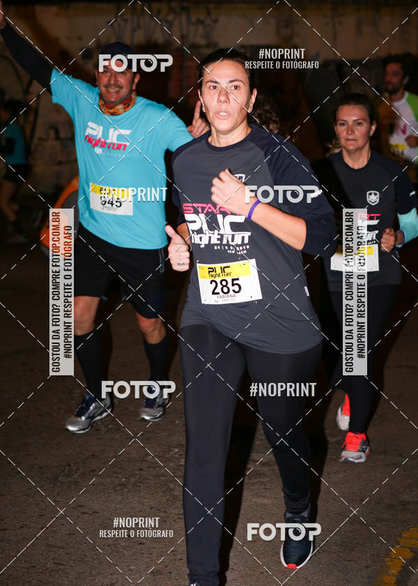 Buy your photos of the eventPUC NIGHT RUN on Fotop