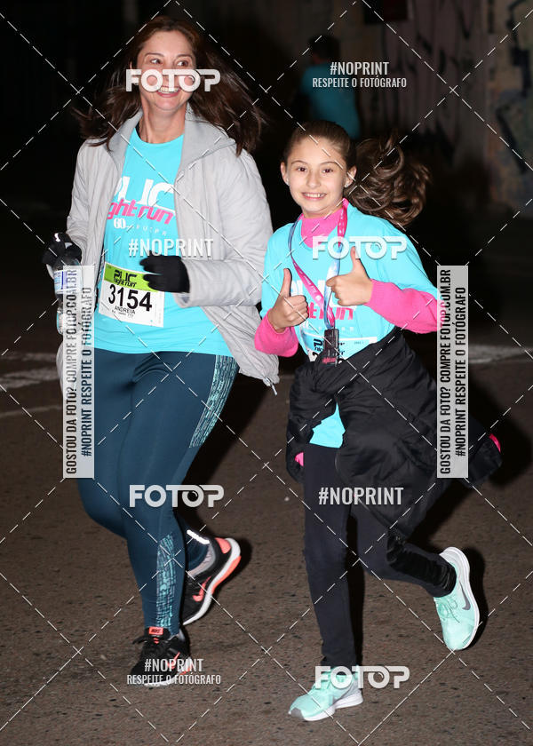 Buy your photos of the eventPUC NIGHT RUN on Fotop
