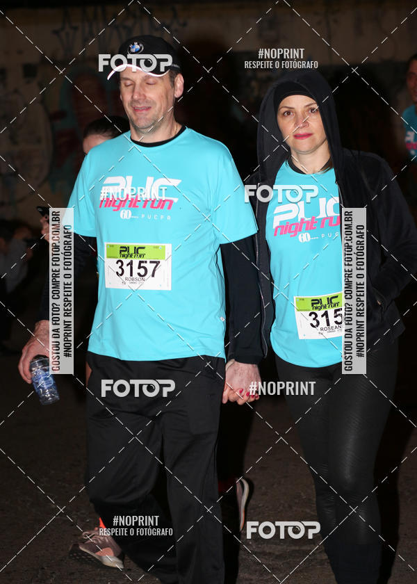 Buy your photos of the eventPUC NIGHT RUN on Fotop